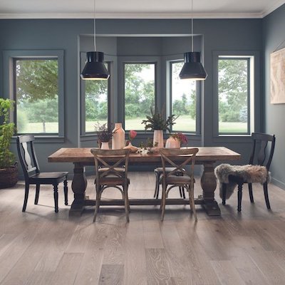 cool toned hardwood floors in a stylish dinging room